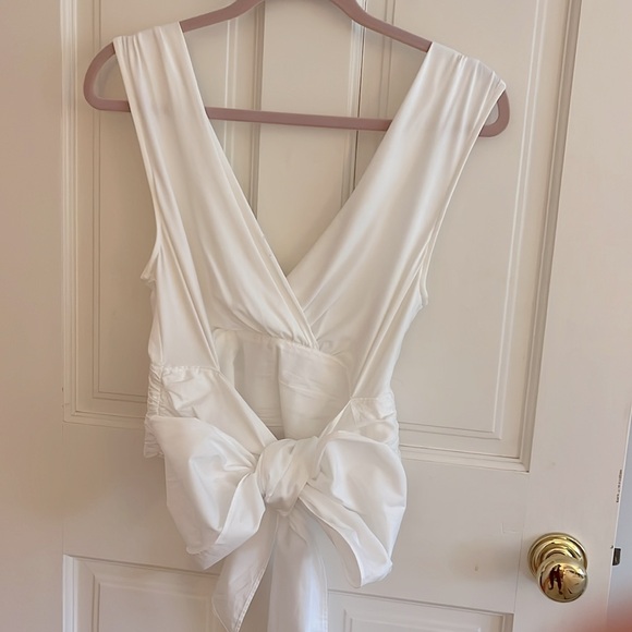 Vneck sleeveless wrap tie blouse. - Picture 5 of 7